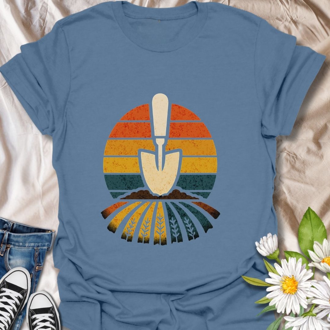 Vintage gardening t-shirt with retro sunset stripes and a bold trowel design rising from stylized crop rows. A perfect gift for gardeners, farmers, and nature lovers who dig dirt, sunshine, and sustainability.