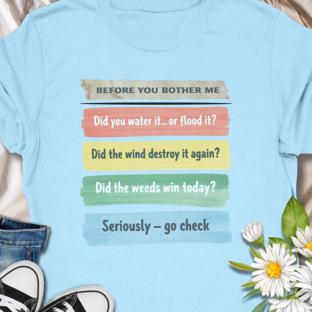 This funny “Before You Bother Me” gardening shirt is perfect for plant lovers who are tired of answering the same questions. With a checklist of gardening woes — from watering mistakes to weed takeovers — it's a humorous and relatable gift for gardeners. Great for anyone with a green thumb and a sense of sarcasm!