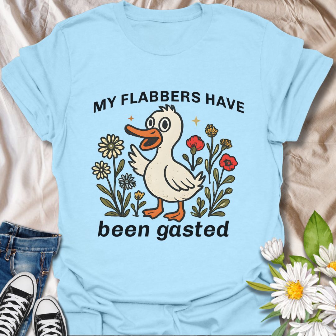 Add a splash of humor to your wardrobe with this quirky “My Flabbers Have Been Gasted” t-shirt featuring an adorable duck and whimsical flowers. A hilarious conversation starter and perfect gift for pun lovers, meme fans, or anyone who appreciates playful and unexpected expressions.