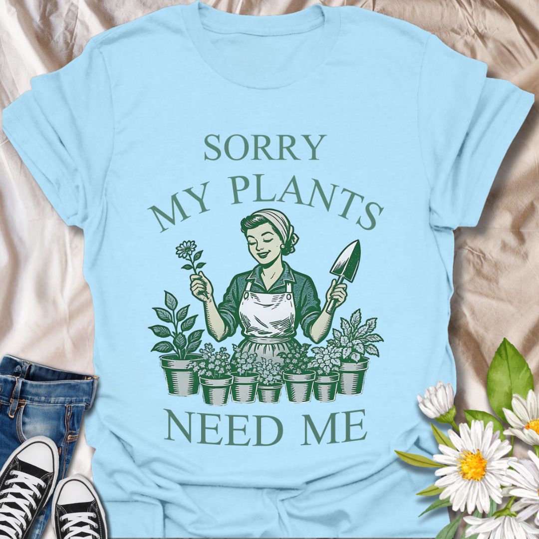 Celebrate your love for gardening with this vintage-style graphic t-shirt featuring a retro gardener surrounded by plants and the funny phrase "Sorry, My Plants Need Me." Perfect for plant parents, garden enthusiasts, and anyone proud of their green thumb.