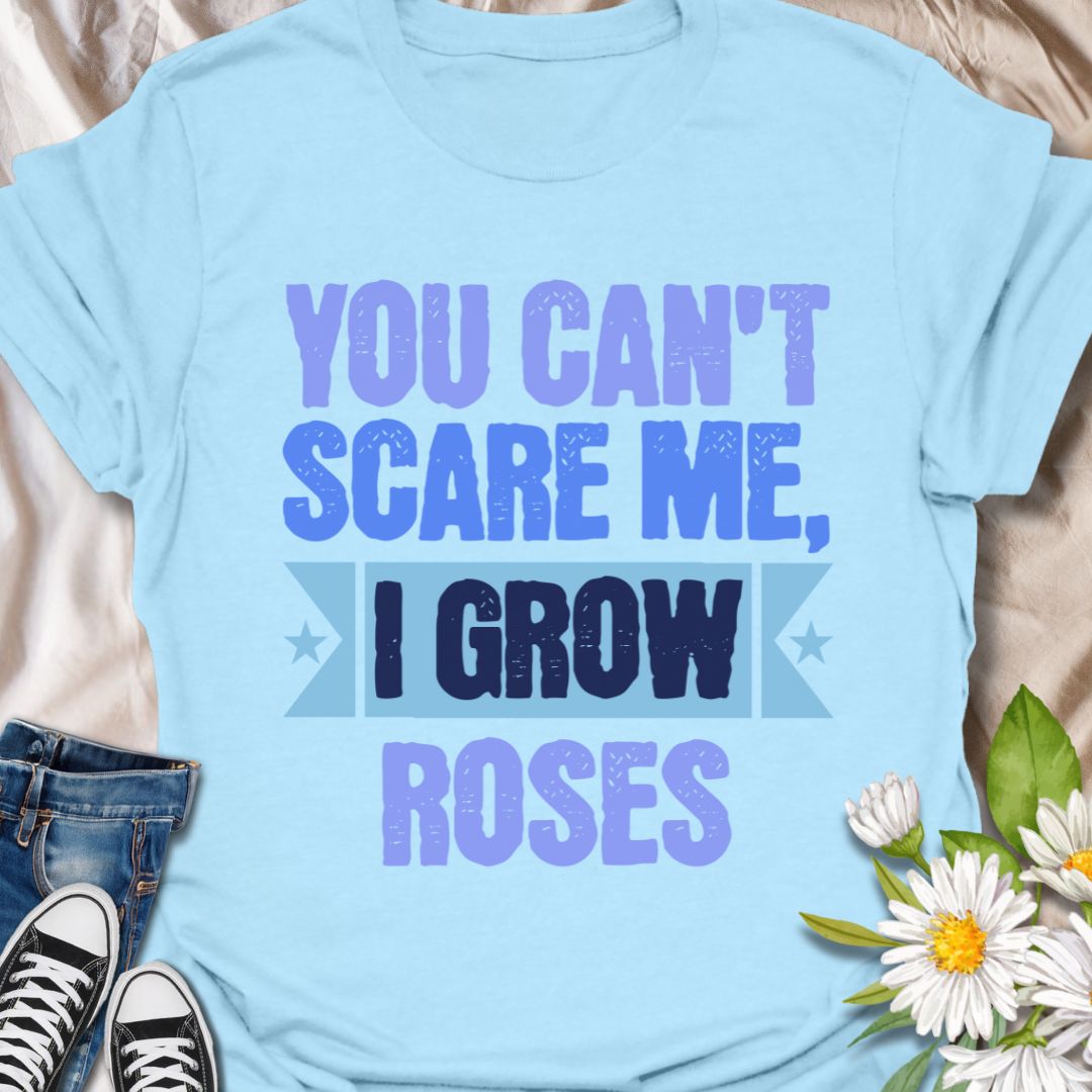 Show off your fearless green thumb with this bold "You Can't Scare Me, I Grow Roses" t-shirt. Designed for confident gardeners and rose enthusiasts who know the thorny truth of growing beauty. A perfect gift for plant lovers who aren’t afraid of a few pricks!
