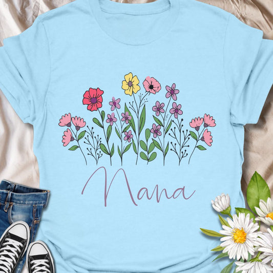 Celebrate a special Nana with this beautiful floral design tee. Perfect for grandmothers who love flowers, gardening, and thoughtful gifts. A heartwarming and nature-inspired gift idea for birthdays, Mother's Day, or just because.