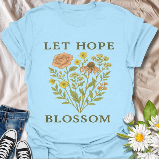 Inspire positivity with this beautifully illustrated floral graphic t-shirt featuring the uplifting phrase "Let Hope Blossom." A perfect choice for nature lovers, flower enthusiasts, and anyone who embraces optimism and growth through meaningful, botanical-themed apparel.