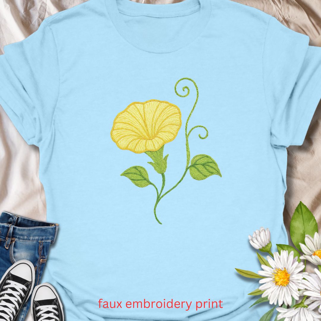 Add a touch of garden charm to your outfit with this faux embroidery t-shirt featuring a delicate yellow morning glory flower. Designed with a stitched-look finish, this nature-inspired tee is perfect for plant lovers, gardeners, and fans of floral simplicity. A soft, botanical vibe for everyday wear or gifting.
