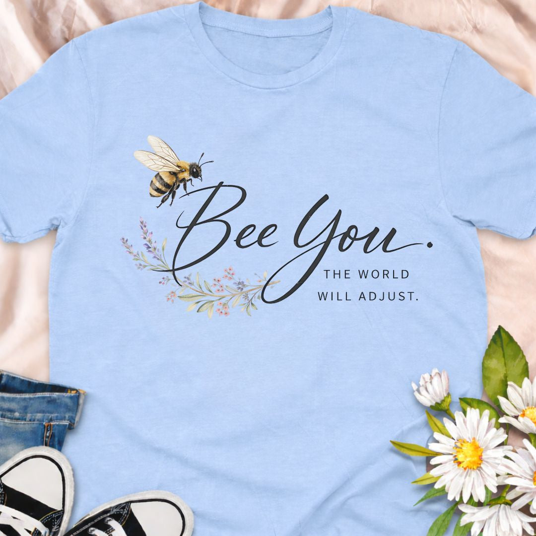 Bee You, the world will adjust. This inspirational bee and botanical t-shirt celebrates self-confidence, authenticity, and nature-led living. A thoughtful gift for bee lovers, plant lovers, and anyone who believes in staying true to themselves.