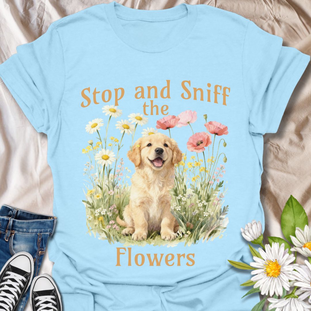 This adorable t-shirt combines floral charm with a happy pup and a gentle reminder to slow down and enjoy the little things. A fun design for dog lovers and garden enthusiasts alike.