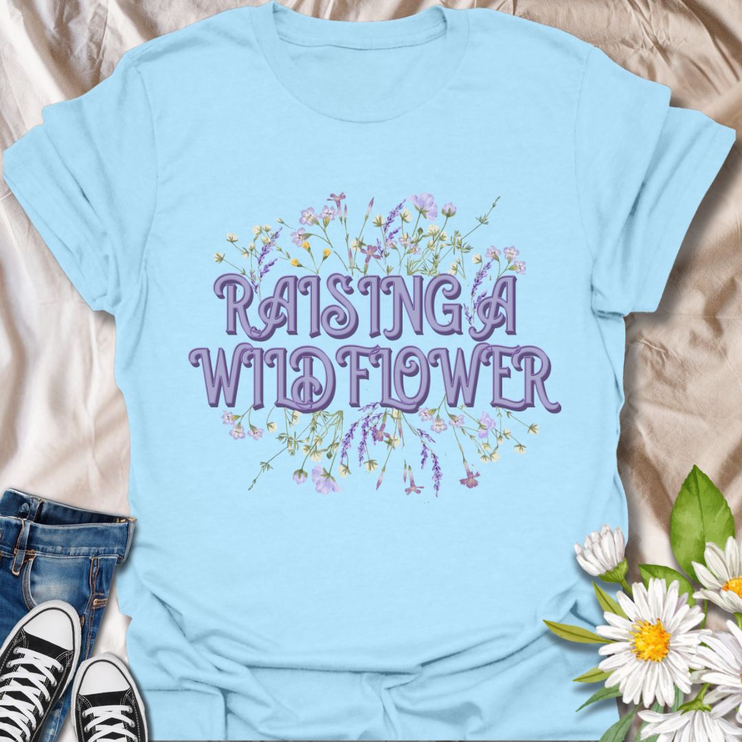 Adorable “Raising a Wildflower” t-shirt with soft pastel wildflowers and playful retro typography. A sweet tee for moms raising free-spirited kids, nature lovers, or wildflower fans. Perfect gift for proud plant moms and botanical boho style lovers.