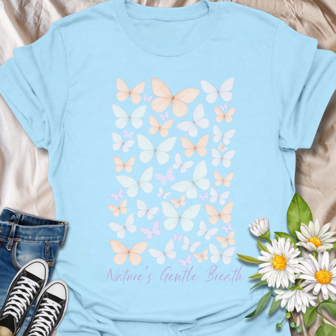Soft pastel butterfly t-shirt with calming peach, lilac, and ivory tones and the phrase “Nature’s Gentle Breath.” A peaceful, nature-loving design perfect for mindful souls, butterfly fans, and lovers of quiet beauty.