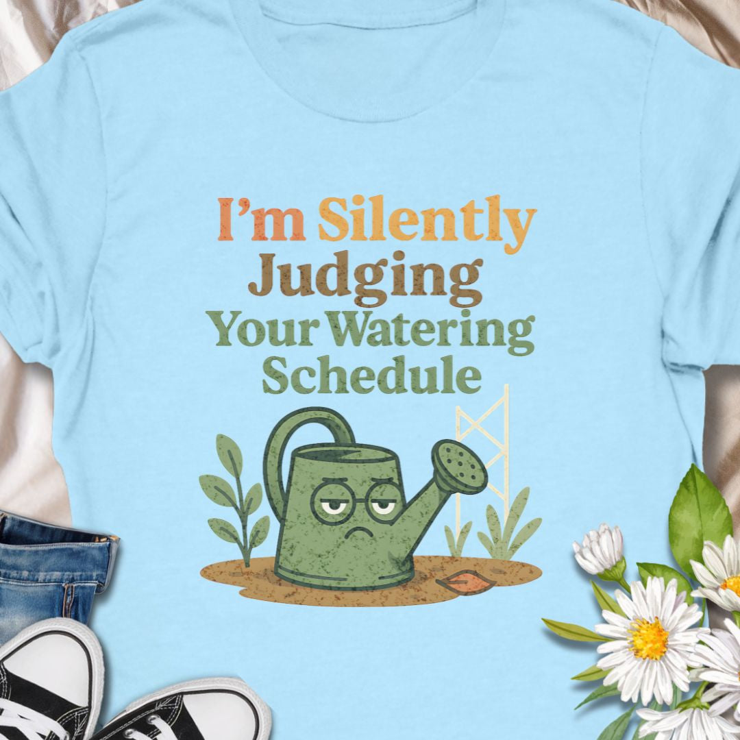 Show off your plant-parent sass with this “I’m Silently Judging Your Watering Schedule” tee featuring a grumpy watering can. A hilarious gift for  moms, dads, grandparents, anyone who enjoys their garden.  This tee shows a love for keeping  leafy friends happy, in a sarcastic way.   Ideal for houseplant lovers and garden geeks alike.