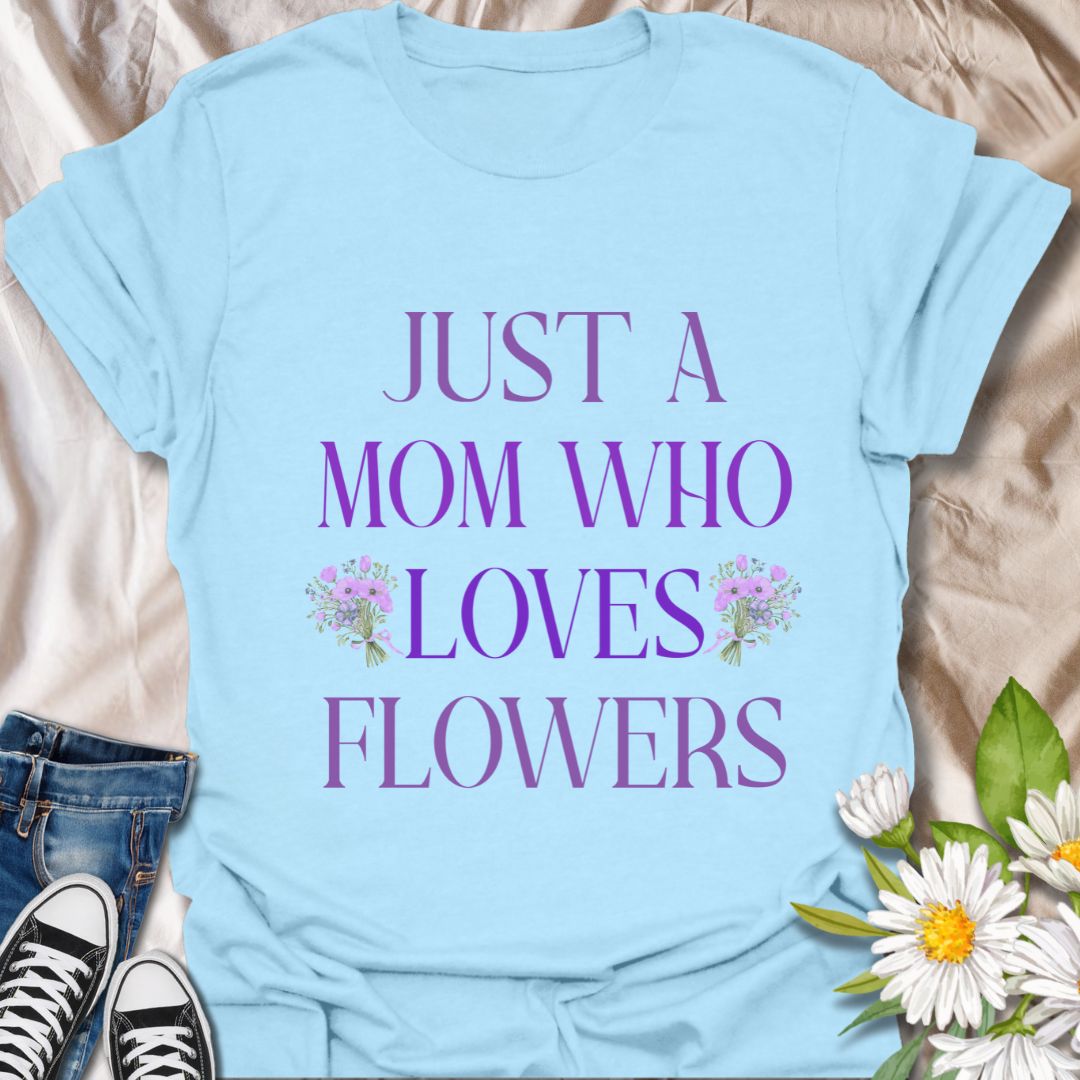 Sweet floral t-shirt with “Just a Mom Who Loves Flowers” design. Perfect Mother’s Day gift for flower-loving moms, gardeners, and nature lovers. Ideal for plant moms, garden enthusiasts, wildflower fans, and anyone who finds joy in beautiful blooms.
