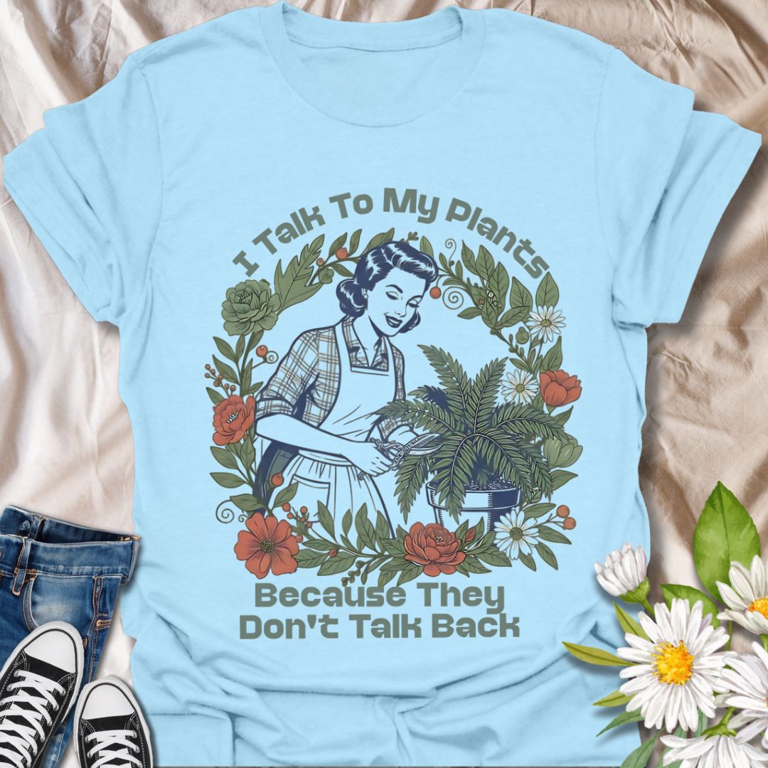 Channel your inner plant whisperer with this vintage-style t-shirt that says “I Talk to My Plants Because They Don’t Talk Back.” A humorous design perfect for plant parents and introverts.
