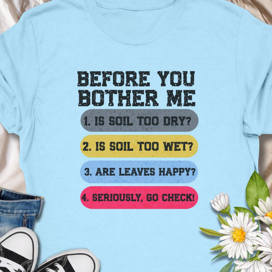 This tee speaks with a wry, green-thumbed voice. The front print lists a gardener’s quick checklist — soil too dry? too wet? are the leaves happy? — finished with a bright, humorous nudge to “go check.” The t-shirt carries a playful, knowledgeable tone that fellow plant lovers will recognize and laugh at.