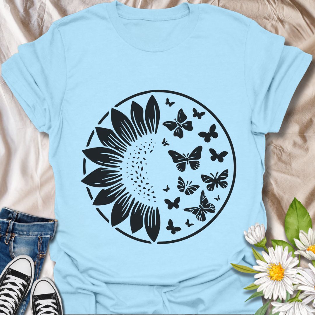 Stylish sunflower and butterflies circle t-shirt featuring bold white line art. Perfect for nature lovers, garden enthusiasts, and floral fashion fans. A botanical tee celebrating growth, beauty, and transformation with a modern minimalist twist.