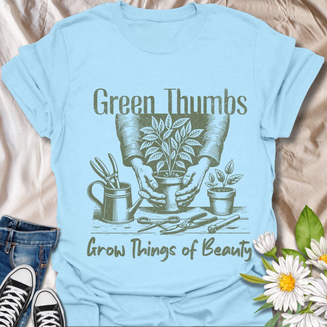 Celebrate the magic of gardening with this “Green Thumbs Grow Things of Beauty” t-shirt. Featuring a rustic hand-drawn design of planting tools and flourishing foliage, it’s the perfect gift for plant lovers and garden gurus alike.
