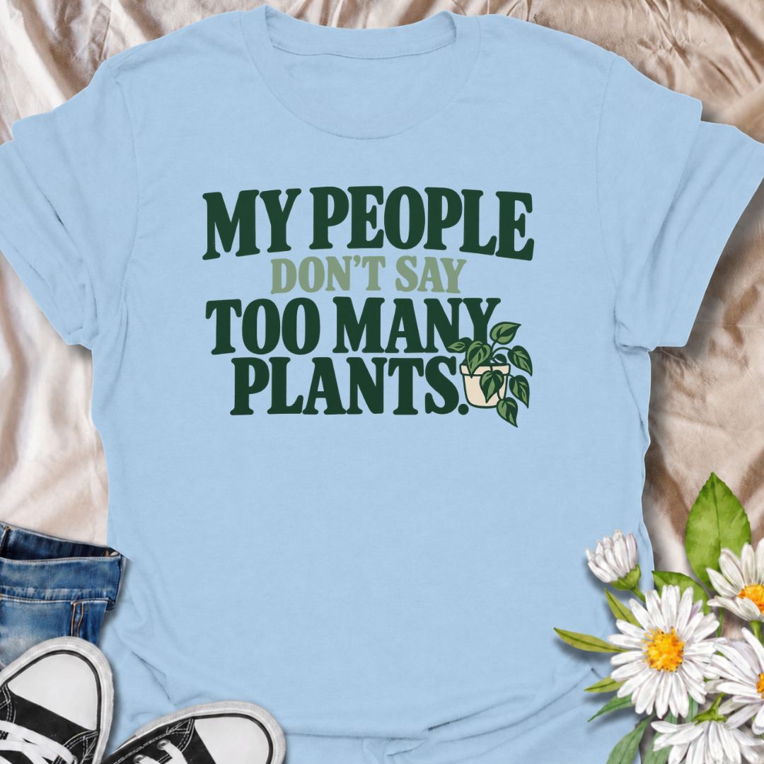 A funny plant T-shirt for anyone who knows the right people never say you have too many plants. The phrase “My People Don’t Say Too Many Plants” turns plant collecting into a little badge of belonging for houseplant lovers and indoor gardeners. Featuring bold retro typography with a simple trailing plant accent, the design stays clean, readable, and easy to wear. It makes a great gift for plant parents, nursery regulars, and anyone whose friends fully support one more plant purchase. Perfect for plant swaps