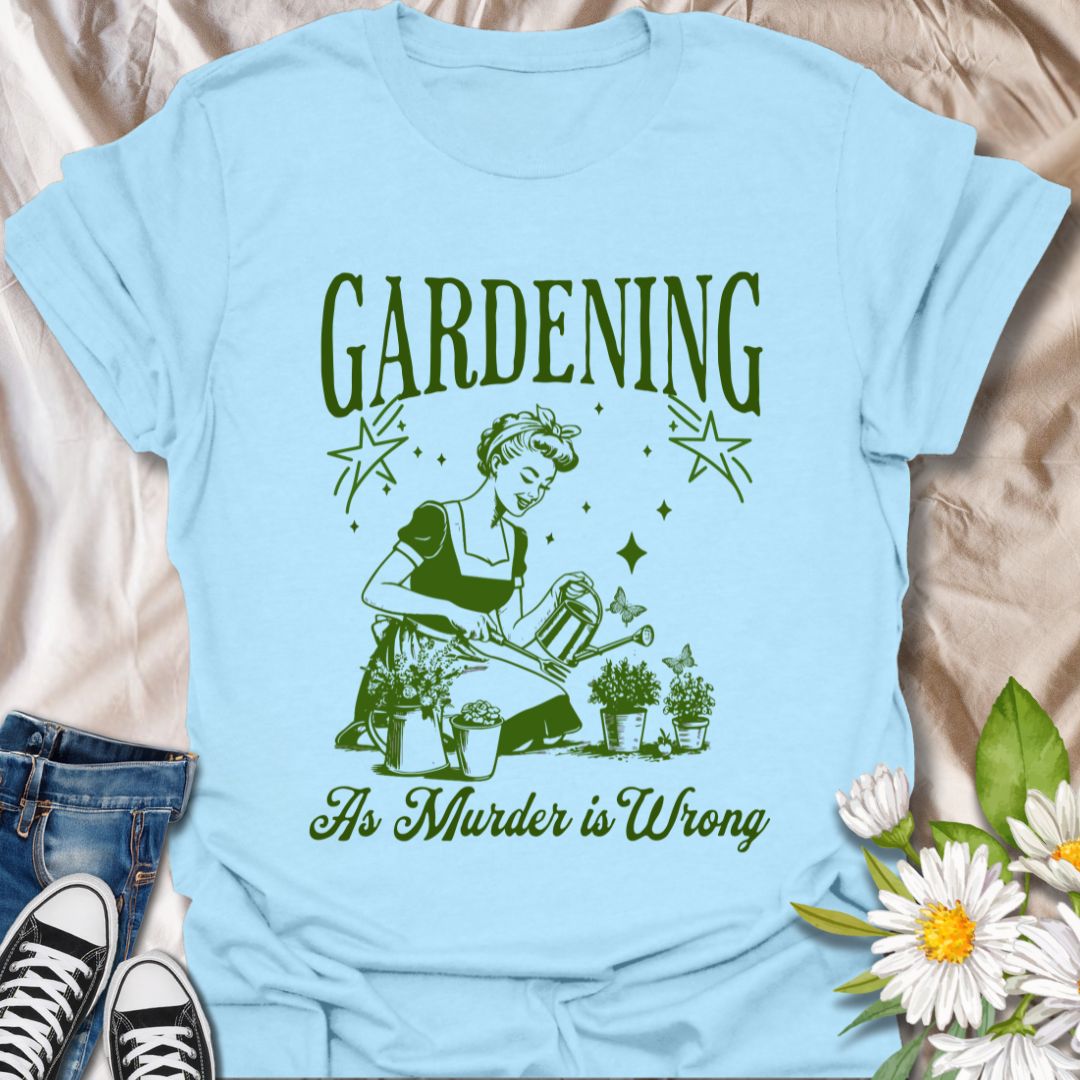 Dark humor gardening t-shirt with retro housewife design and “Gardening Because Murder is Wrong” text. Ideal for plant moms, gardeners, and those who love sarcastic garden humor.  Light Blue