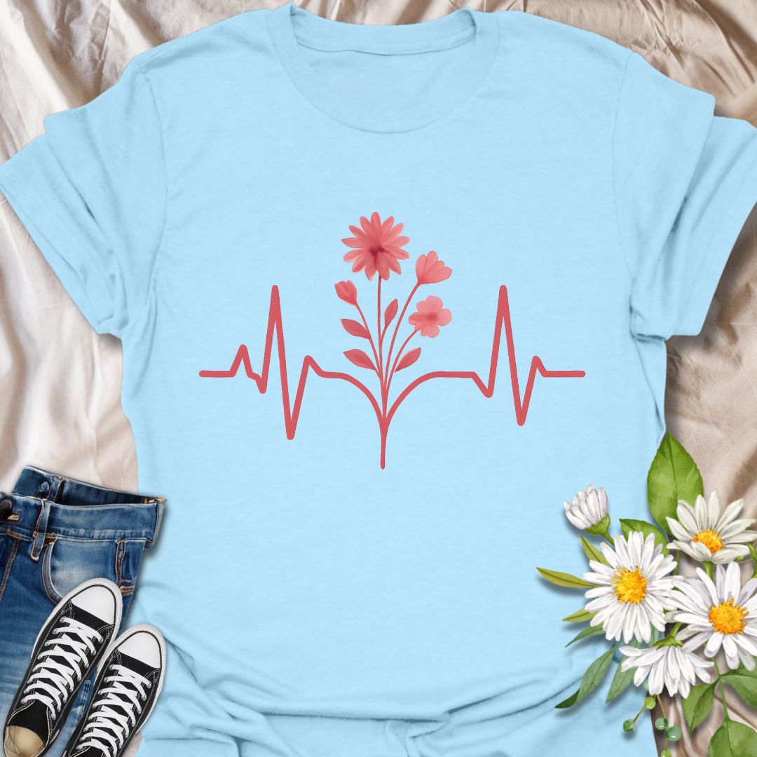 Minimalist flower heartbeat t-shirt featuring a soft red floral stem growing from a heart rhythm line. A meaningful, nature-meets-wellness design ideal for nurses, plant lovers, and anyone who feels alive in nature. Great gift for healthcare heroes, garden lovers, and flower fans alike