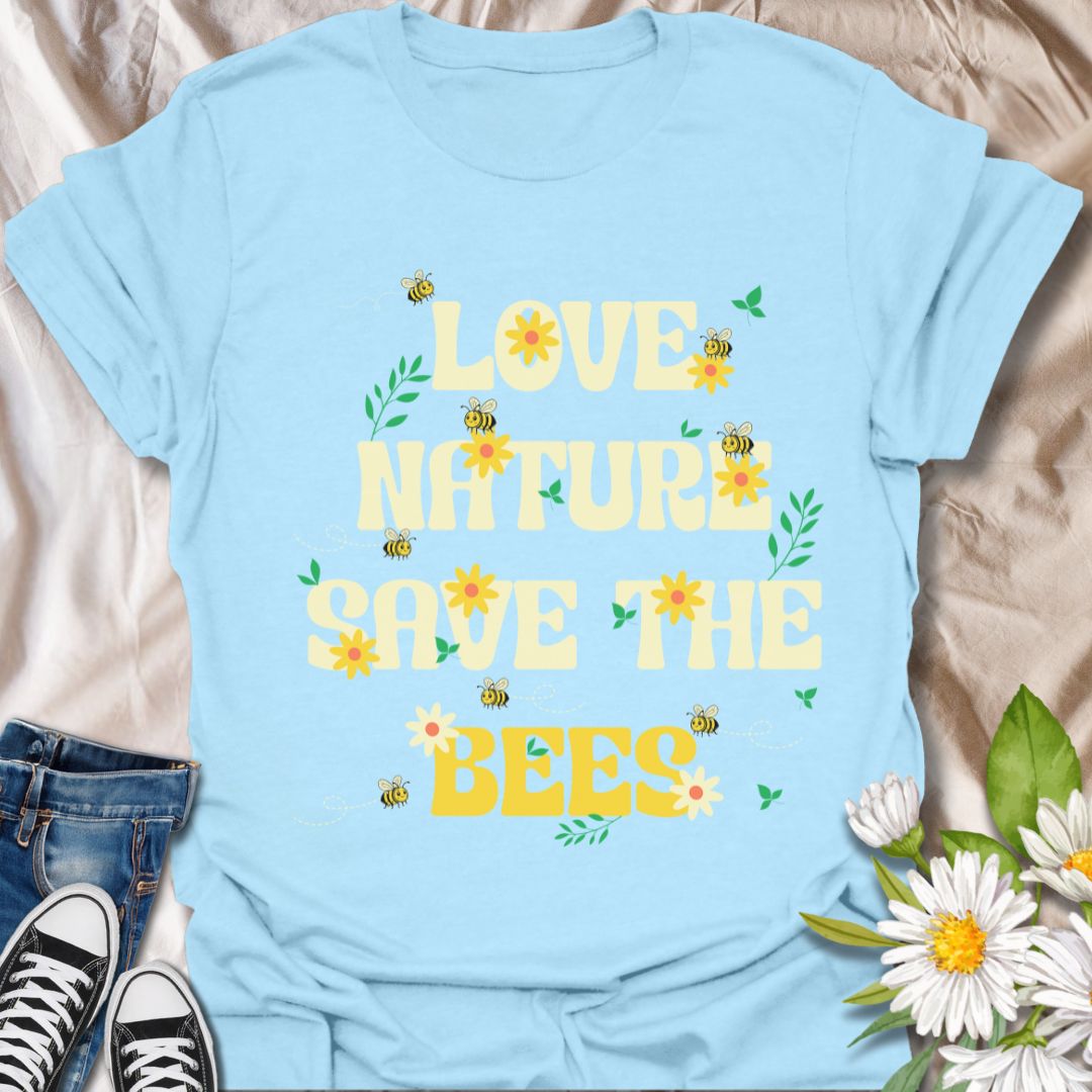 Bright "Love Nature Save The Bees" t-shirt with playful yellow typography, buzzing bees, and cheerful flower accents. Ideal for bee lovers, pollinator supporters, gardeners, environmental advocates, and nature enthusiasts. Perfect eco-friendly gift, conservation awareness shirt, botanical fashion, and sustainable garden apparel.