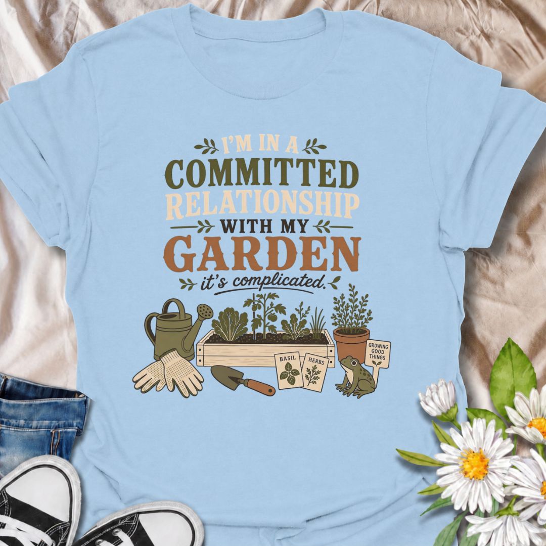 Celebrate your most dependable relationship with this funny gardening T-shirt. Featuring the phrase “I’m in a Committed Relationship With My Garden,” it is perfect for gardeners who would rather spend their time among plants, herbs, and raised beds. A charming gift for garden lovers, plant moms, and backyard growers.