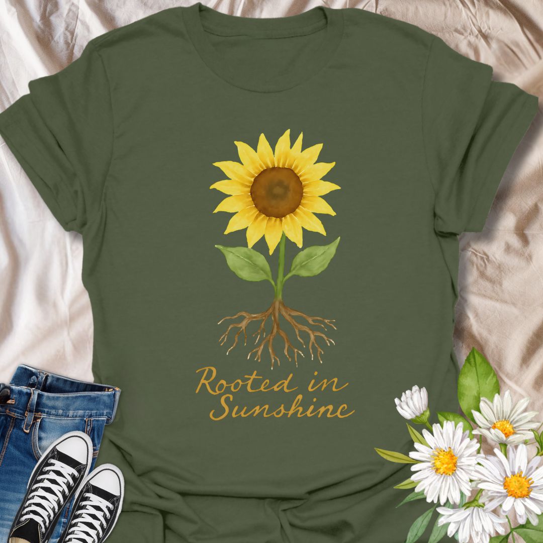 Uplifting sunflower t-shirt with detailed roots and the inspiring phrase ‘Rooted in Sunshine.’ Perfect for nature lovers, gardeners, plant moms, and anyone who finds strength and joy in growth, positivity, and sunshine. A thoughtful gift for self-care, mindfulness, and outdoor enthusiasts.