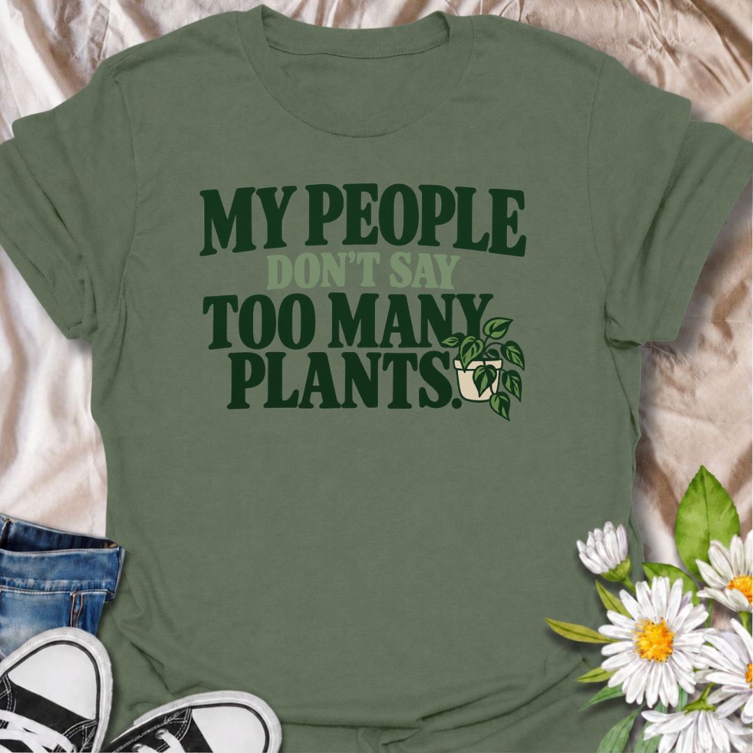 A funny plant T-shirt for anyone who knows the right people never say you have too many plants. The phrase “My People Don’t Say Too Many Plants” turns plant collecting into a little badge of belonging for houseplant lovers and indoor gardeners. Featuring bold retro typography with a simple trailing plant accent, the design stays clean, readable, and easy to wear. It makes a great gift for plant parents, nursery regulars, and anyone whose friends fully support one more plant purchase. Perfect for plant swaps