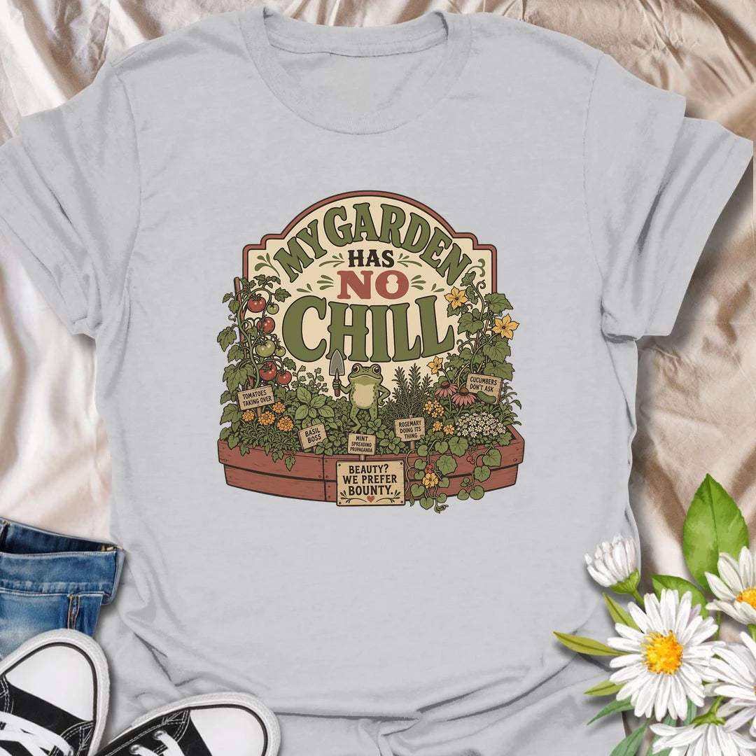 Funny garden t-shirt for gardeners whose raised beds are full of wild growth and zero chill.
Features a lush vegetable and herb garden with a bold message and playful frog detail.
Perfect for veggie gardeners, herb lovers, frog fans, and anyone whose garden grows a little out of control.