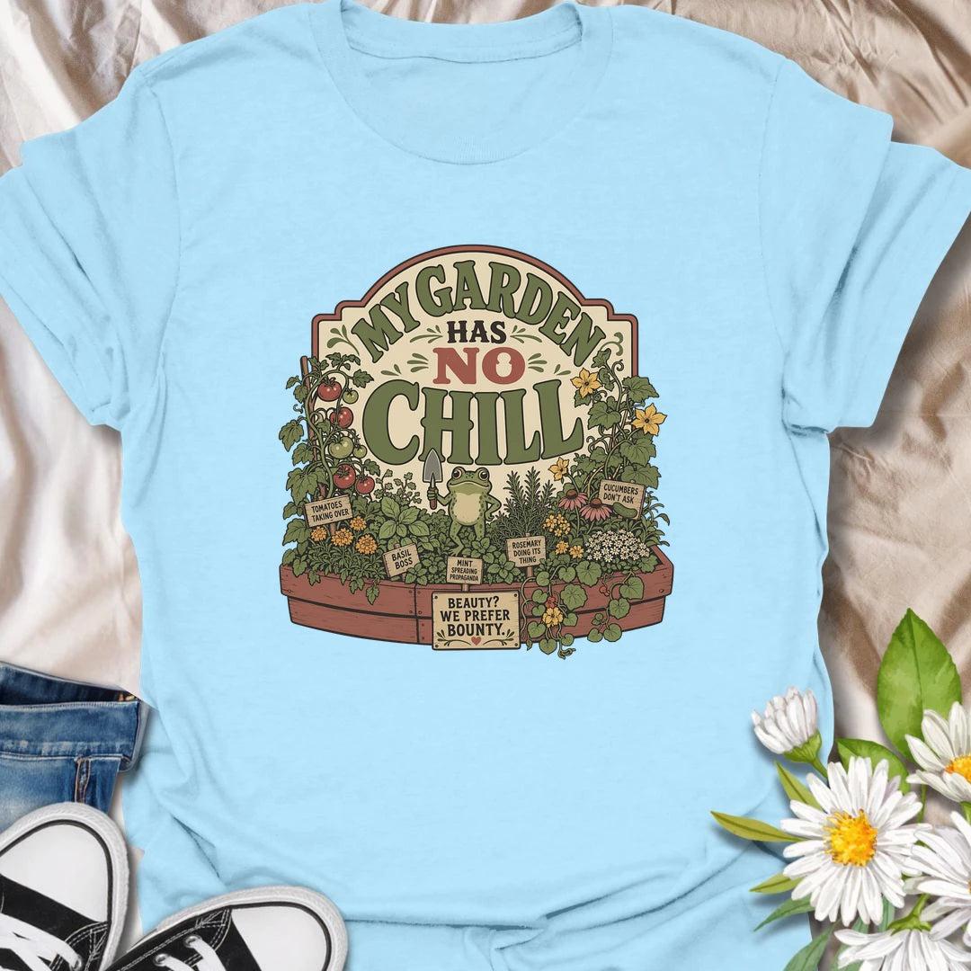 Funny garden t-shirt for gardeners whose raised beds are full of wild growth and zero chill.
Features a lush vegetable and herb garden with a bold message and playful frog detail.
Perfect for veggie gardeners, herb lovers, frog fans, and anyone whose garden grows a little out of control.