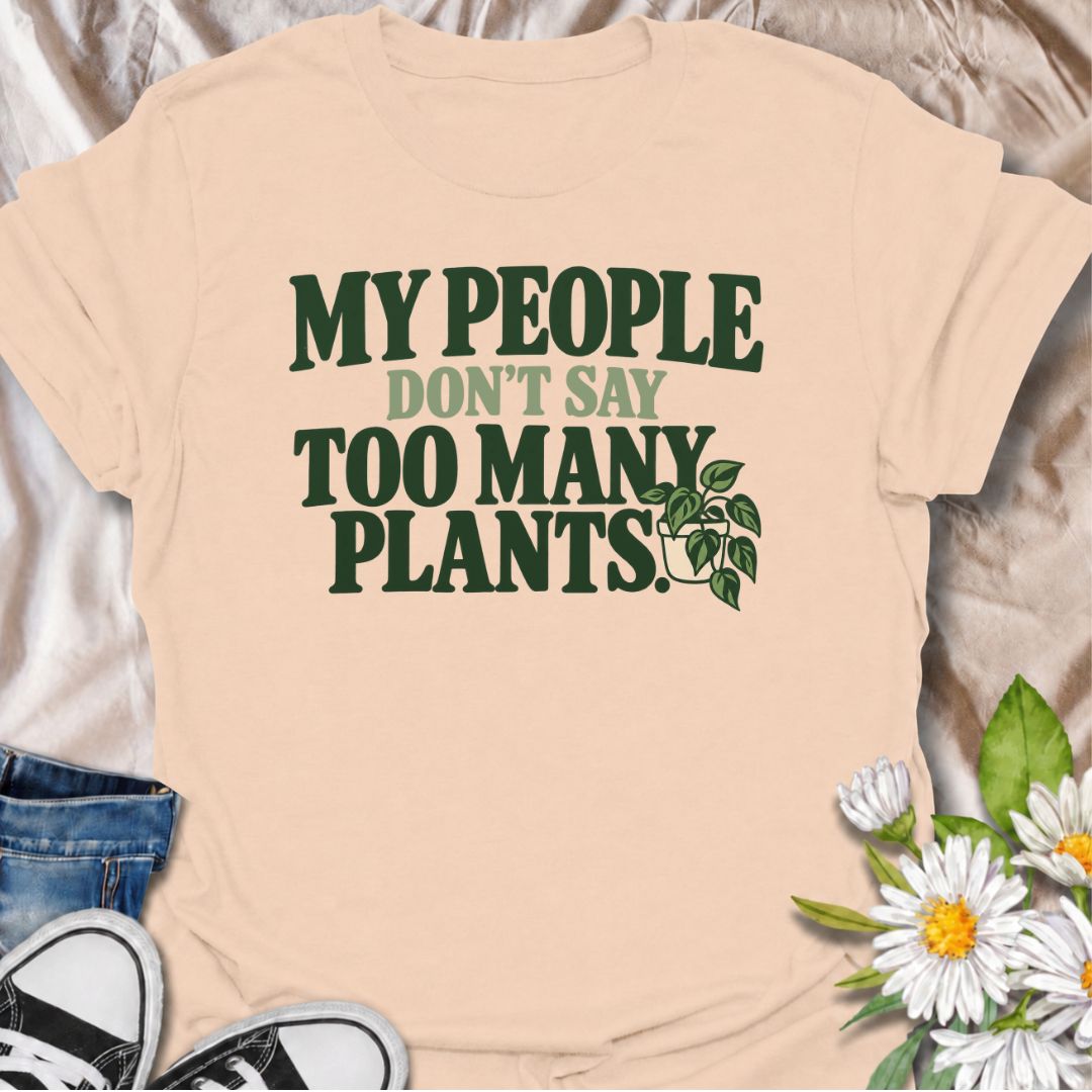 A funny plant T-shirt for anyone who knows the right people never say you have too many plants. The phrase “My People Don’t Say Too Many Plants” turns plant collecting into a little badge of belonging for houseplant lovers and indoor gardeners. Featuring bold retro typography with a simple trailing plant accent, the design stays clean, readable, and easy to wear. It makes a great gift for plant parents, nursery regulars, and anyone whose friends fully support one more plant purchase. Perfect for plant swaps