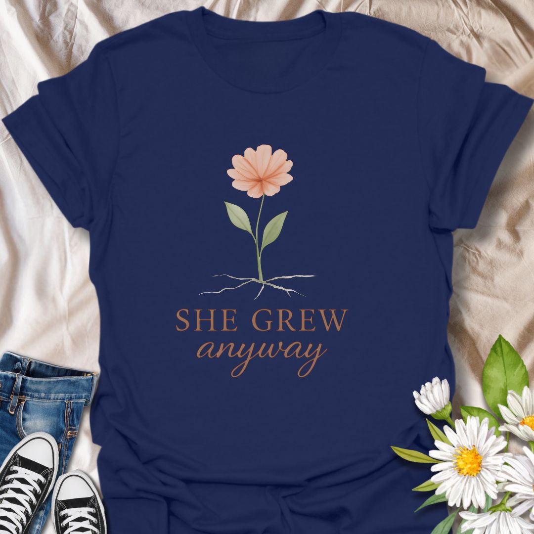 Celebrate resilience and personal growth with the “She Grew Anyway” t-shirt. Featuring a delicate hand-drawn flower with exposed roots, this inspirational design symbolizes strength, healing, and blooming through adversity. Perfect for mental health awareness, self-love, and empowerment, this floral graphic tee makes a meaningful gift for women, plant lovers, and anyone on a journey of growth and self-discovery.