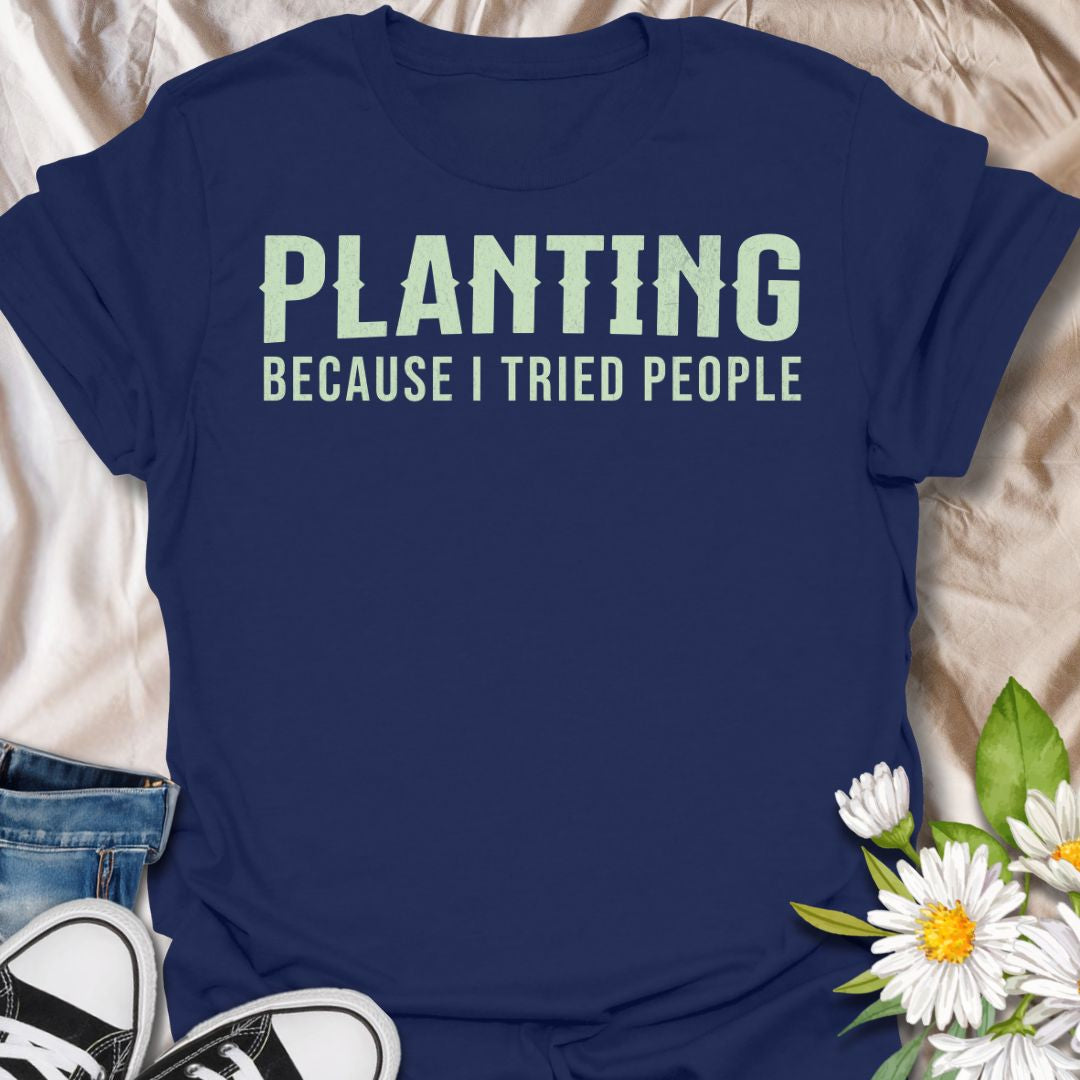 This Planting Because I Tried People t-shirt is made for gardeners and plant lovers who prefer soil, seedlings, and quiet plant time over unnecessary social interaction. Featuring bold simple typography with a funny introvert gardening message, this design has a clean, easy-to-wear look for everyday plant-parent style. Perfect for plant moms, plant dads, gardeners, houseplant lovers, introverts, and anyone who has officially chosen planting over people.
