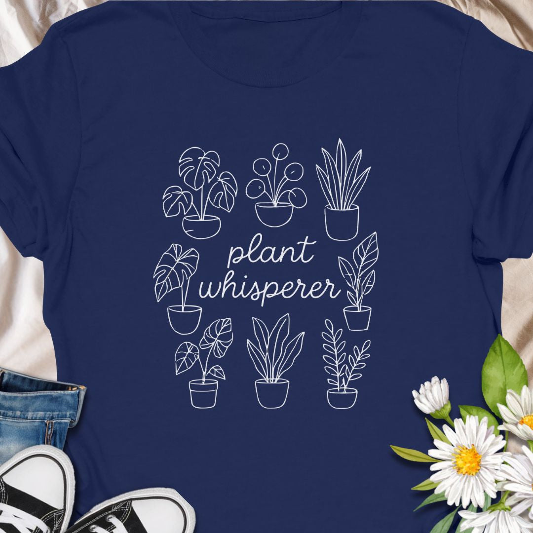 Speak fluent foliage with this "Plant Whisperer" t-shirt – a minimalist, hand-drawn design perfect for indoor plant lovers, proud plant parents, and botanical enthusiasts. A stylish and subtle gift for houseplant collectors and green-thumbed friends.