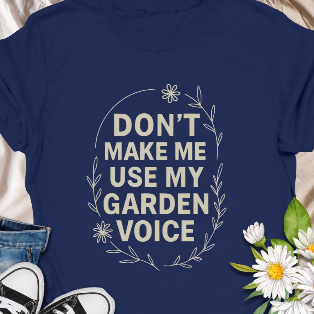 Let your garden attitude bloom with this funny “Don’t Make Me Use My Garden Voice” t-shirt. Ideal for gardeners who aren’t afraid to speak their mind—or to shout over the hedge! This tee makes a perfect gift for plant moms, green thumbs, or anyone who runs on coffee and compost.
