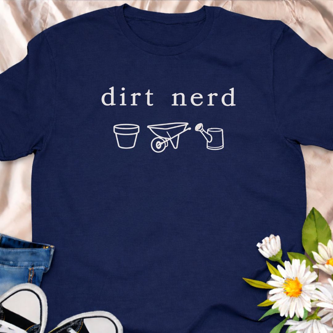 “Dirt Nerd” minimalist gardening t-shirt for plant lovers and gardeners. Subtle botanical humour tee featuring simple garden icons. Perfect for plant parents, garden enthusiasts, and anyone proudly obsessed with soil, plants, and growing things. A great gift for gardeners and plant nerds.