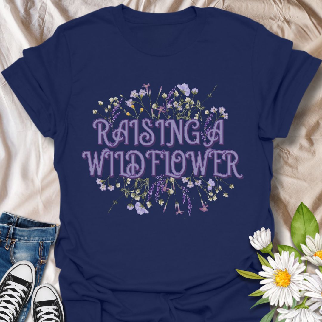 Adorable “Raising a Wildflower” t-shirt with soft pastel wildflowers and playful retro typography. A sweet tee for moms raising free-spirited kids, nature lovers, or wildflower fans. Perfect gift for proud plant moms and botanical boho style lovers.