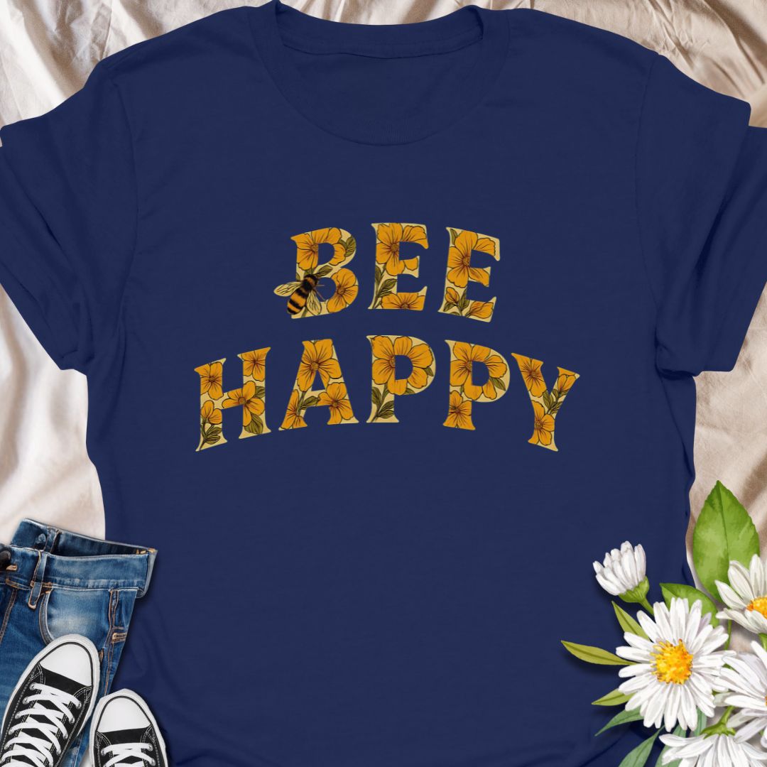 Spread positivity and nature-loving vibes with this charming “Bee Happy” t-shirt, featuring sunflower-filled typography and a playful bee motif. Perfect for beekeepers, garden lovers, and anyone who appreciates cheerful, nature-inspired fashion. A great gift for pollinator advocates and flower enthusiasts.