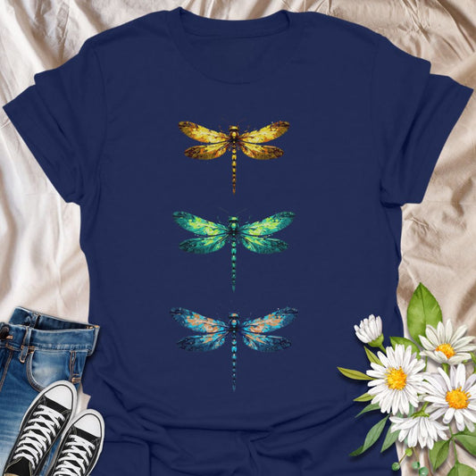 Striking dragonfly t-shirt featuring three vibrant, artistic dragonflies in golden, teal, and blue hues. A bold nature-inspired design perfect for insect lovers, outdoor wanderers, and fans of magical wildlife.