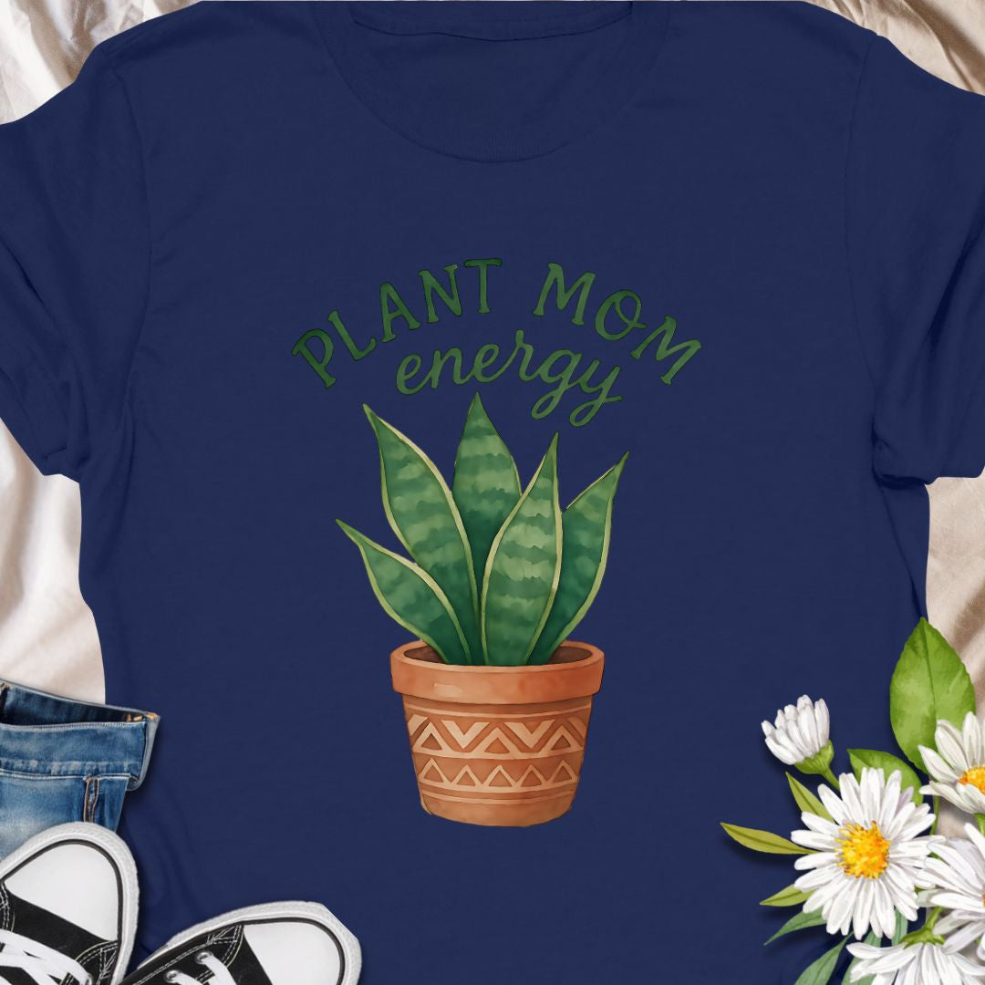 Show off your green thumb with this stylish “Plant Mom Energy” t-shirt featuring a beautiful snake plant in a terracotta pot. Perfect for indoor gardeners and houseplant lovers, this tee radiates nurturing vibes and earthy style. A cozy, cute wardrobe essential for any proud plant mom!