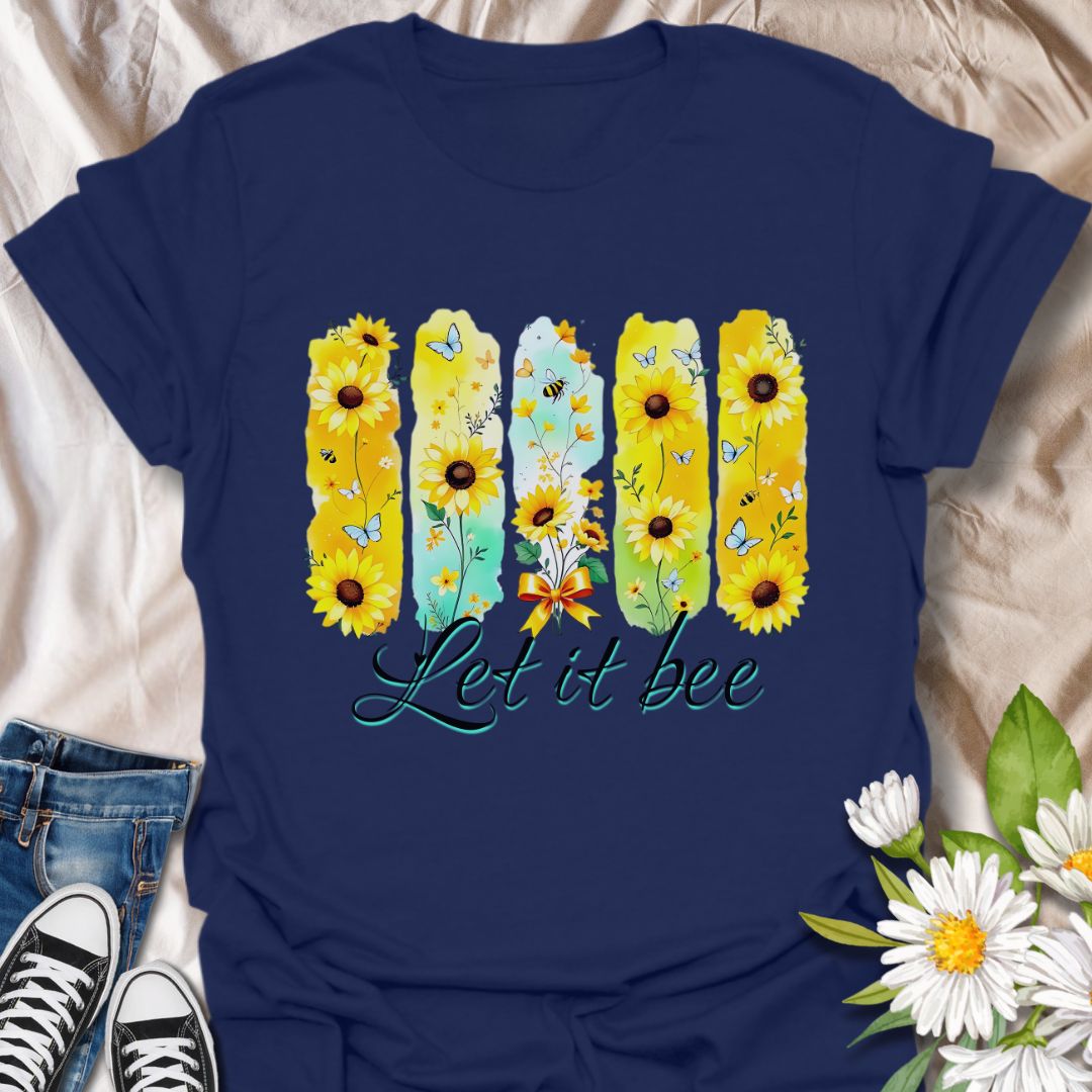 Bright sunflower t-shirt with bees and butterflies and the playful phrase "Let it bee." Perfect for nature lovers, bee enthusiasts, gardeners, and wildflower fans who appreciate pollinators. Fun spring and summer tee celebrating positivity and nature’s beauty. Navy