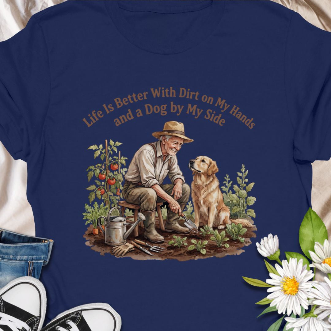 Celebrate the joys of gardening and loyal companionship with this heart warming “Life Is Better With Dirt on My Hands and a Dog by My Side” t-shirt. Featuring a vintage-style illustration of a man and his dog in the garden, this tee is perfect for nature lovers, dog dads, or anyone who finds peace in plants and paws. A thoughtful gift for birthdays, Father’s Day, or just because.