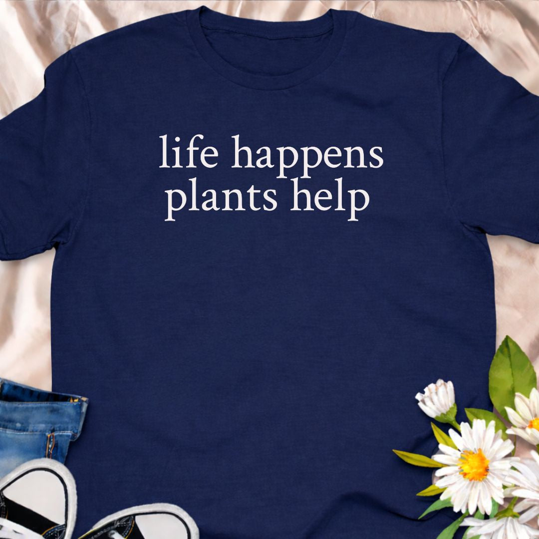 Life happens, plants help. This minimalist botanical t-shirt is designed for plant lovers, gardeners, and anyone who finds comfort in greenery. A calm, thoughtful tee that celebrates nature, self-care, and the healing power of plants.