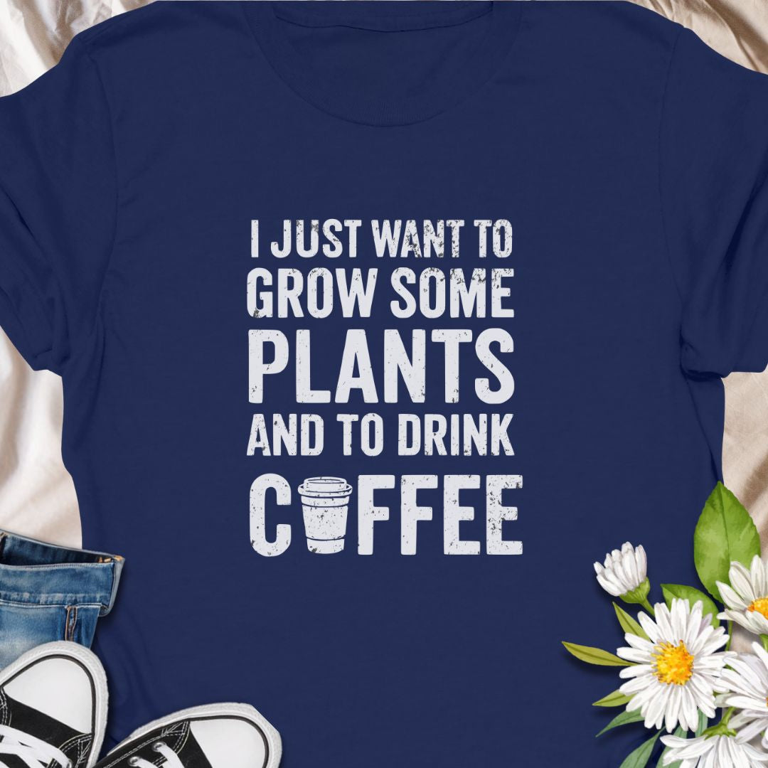 For those who thrive on greenery and caffeine! This “I Just Want to Grow Some Plants and Drink Coffee” shirt is perfect for coffee-loving plant parents. A cozy, humorous tee that pairs well with your morning brew and favorite monstera.