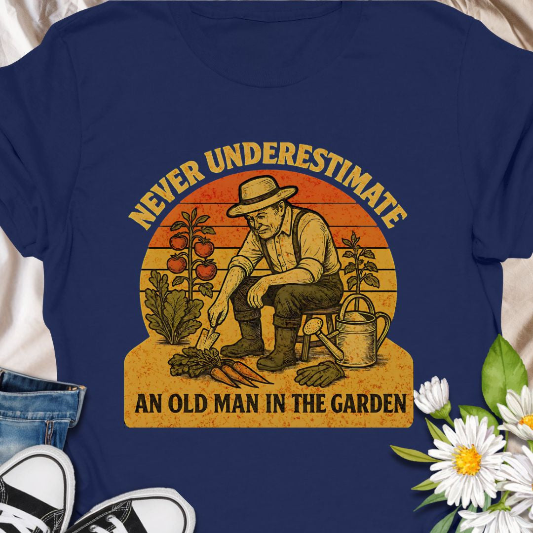 Celebrate gardening wisdom with this “Never Underestimate an Old Man in the Garden” tee featuring a retro-style illustration of a seasoned gardener harvesting his crops. A funny and heart warming shirt for grandpas, dads, or any experienced grower who takes pride in their garden. Makes a thoughtful gift for Father’s Day or retirement.