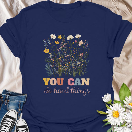 Empower your individuality with this inspiring “be you, the world will adjust” t-shirt design. Featuring whimsical floral and nature-themed elements like bees and butterflies, this uplifting graphic tee promotes self-love, confidence, and authenticity — ideal for free spirits and positivity lovers.