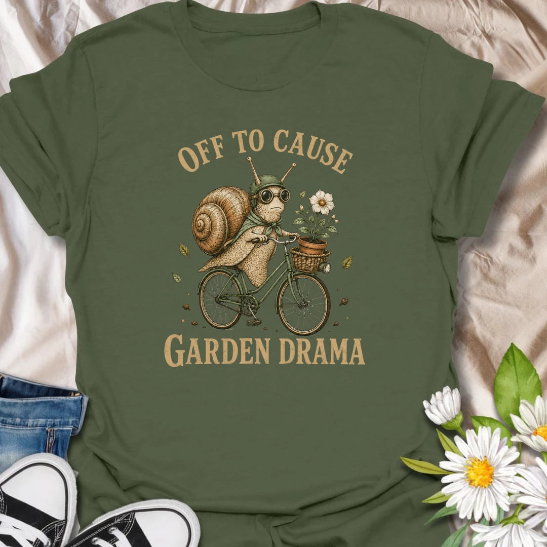This Off To Cause Garden Drama t-shirt is perfect for gardeners, snail lovers, and plant people with a playful sense of humor. Featuring a vintage-style snail riding a bicycle with a flower pot and botanical details, this funny garden design is great for plant lovers, cottagecore fans, nature lovers, and anyone who enjoys whimsical garden chaos.