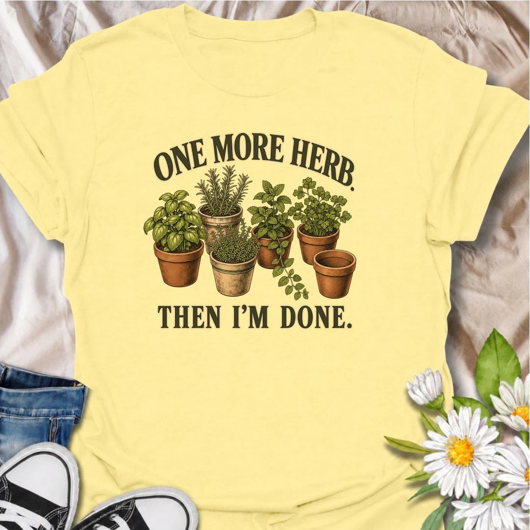 A funny herb garden T-shirt for anyone who keeps promising there is room for just one more pot. Featuring basil, rosemary, mint, thyme, and parsley in vintage-style planters, this design is perfect for kitchen gardeners and herb lovers. The phrase “One More Herb. Then I’m Done.” captures the very familiar habit of turning a small herb collection into an ever-growing one. It makes a great gift for home cooks, container gardeners, and anyone who loves growing fresh herbs. Ideal for gardening days, farmers mar