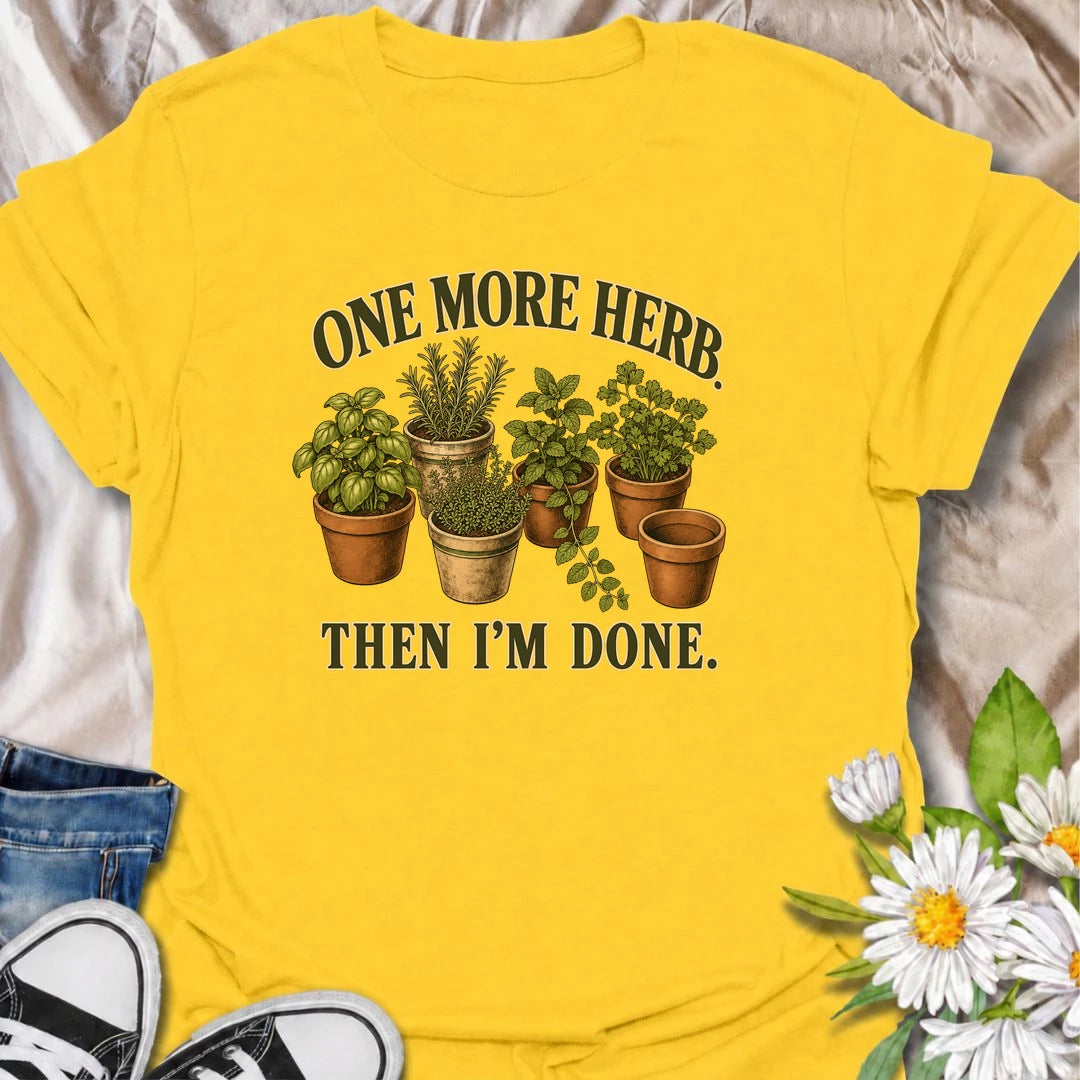 A funny herb garden T-shirt for anyone who keeps promising there is room for just one more pot. Featuring basil, rosemary, mint, thyme, and parsley in vintage-style planters, this design is perfect for kitchen gardeners and herb lovers. The phrase “One More Herb. Then I’m Done.” captures the very familiar habit of turning a small herb collection into an ever-growing one. It makes a great gift for home cooks, container gardeners, and anyone who loves growing fresh herbs. Ideal for gardening days, farmers mar