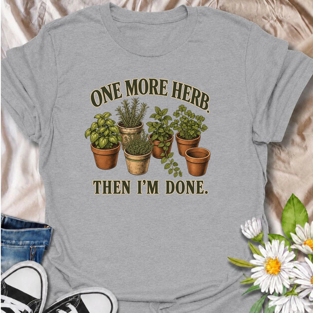 A funny herb garden T-shirt for anyone who keeps promising there is room for just one more pot. Featuring basil, rosemary, mint, thyme, and parsley in vintage-style planters, this design is perfect for kitchen gardeners and herb lovers. The phrase “One More Herb. Then I’m Done.” captures the very familiar habit of turning a small herb collection into an ever-growing one. It makes a great gift for home cooks, container gardeners, and anyone who loves growing fresh herbs. Ideal for gardening days, farmers mar