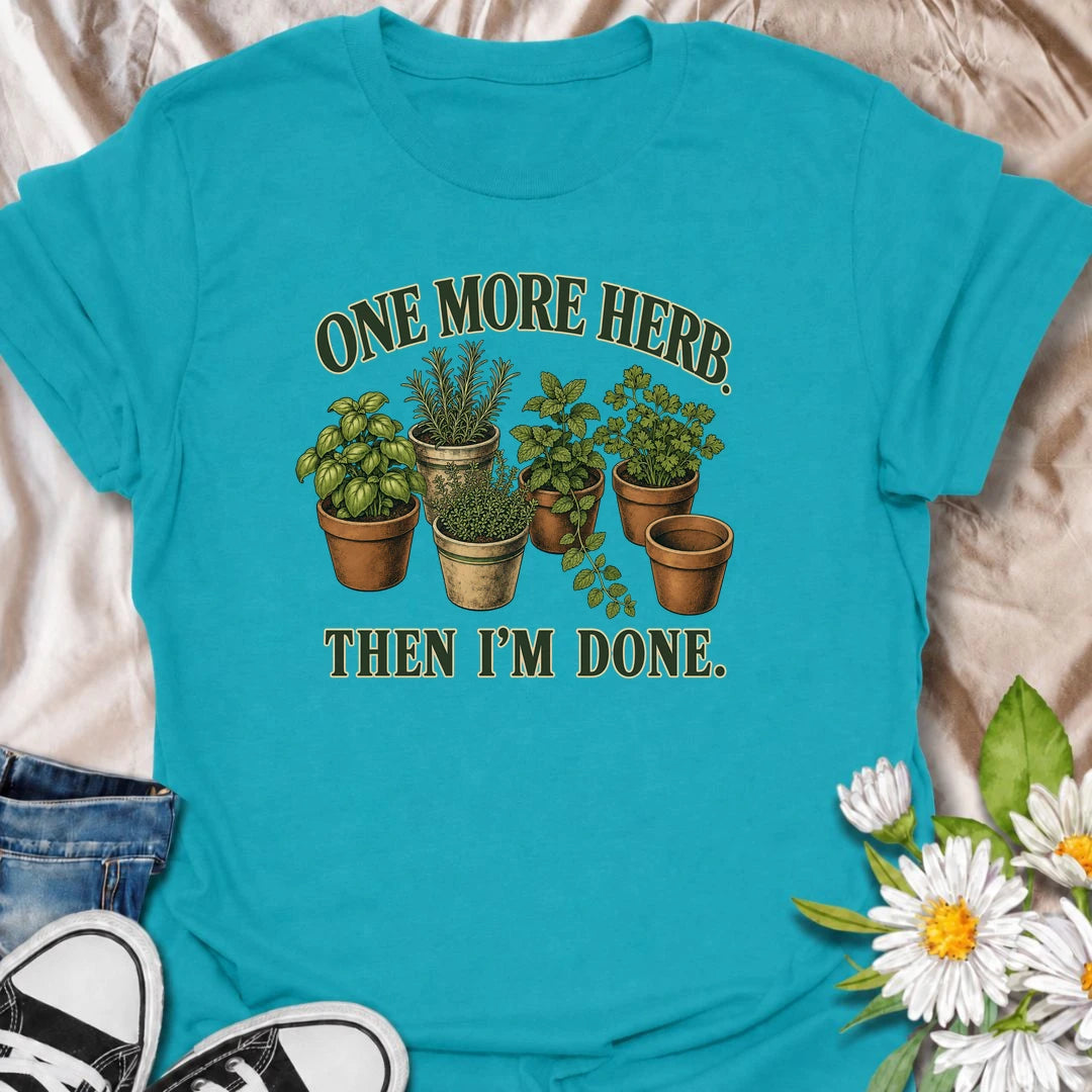A funny herb garden T-shirt for anyone who keeps promising there is room for just one more pot. Featuring basil, rosemary, mint, thyme, and parsley in vintage-style planters, this design is perfect for kitchen gardeners and herb lovers. The phrase “One More Herb. Then I’m Done.” captures the very familiar habit of turning a small herb collection into an ever-growing one. It makes a great gift for home cooks, container gardeners, and anyone who loves growing fresh herbs. Ideal for gardening days, farmers mar