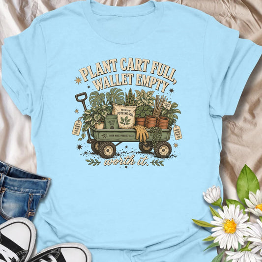 Tell the truth about plant shopping with this “Plant Cart Full, Wallet Empty” T-shirt. Featuring a wagon overflowing with houseplants, soil, pots, gloves, and garden supplies, it perfectly captures the cost of botanical happiness. A funny gift for enthusiastic plant collectors and nursery regulars.