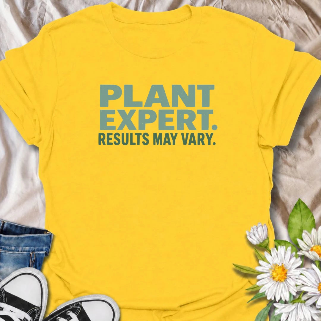 A funny plant T-shirt for anyone who gives great houseplant advice but knows the results are never guaranteed. The phrase “Plant Expert. Results May Vary.” adds dry, self-deprecating humor without overcomplicating the design. Perfect for plant parents, houseplant collectors, indoor gardeners, and anyone who has learned that every plant has a mind of its own. The clean typography makes it an easy everyday shirt and a fun gift for experienced growers and enthusiastic beginners alike. Ideal for nursery trips, 